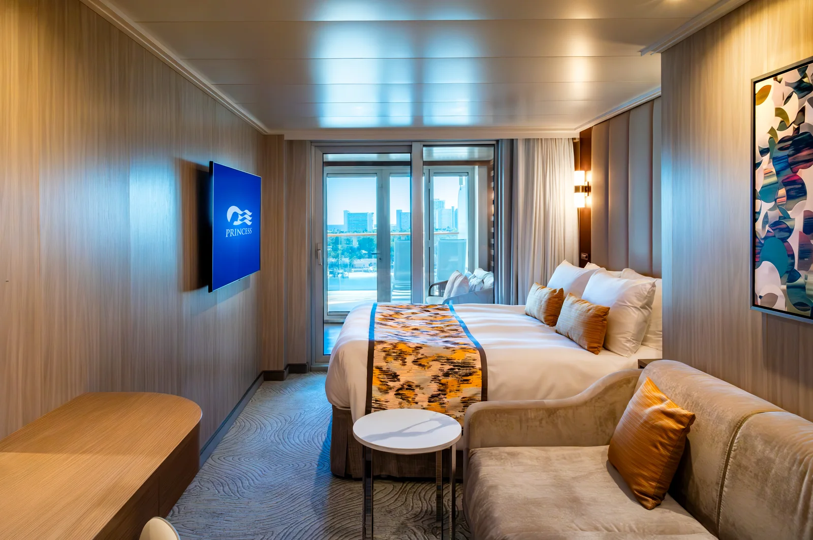 Cabana Mini Suite on Sun Princess with warm wood tones and private balcony
